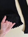 Maglia vintage Yves Saint Laurent nera traforata con profili smerlati