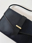 Borsa bandoulière vintage Yves Saint Laurent in tessuto plastificato e pelle blu notte