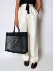 Borsa vintage Fendi in rete mesh nera con maxi logo FF