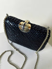 Borsa vintage Rodo in midollino nero con tracolla a catena oro