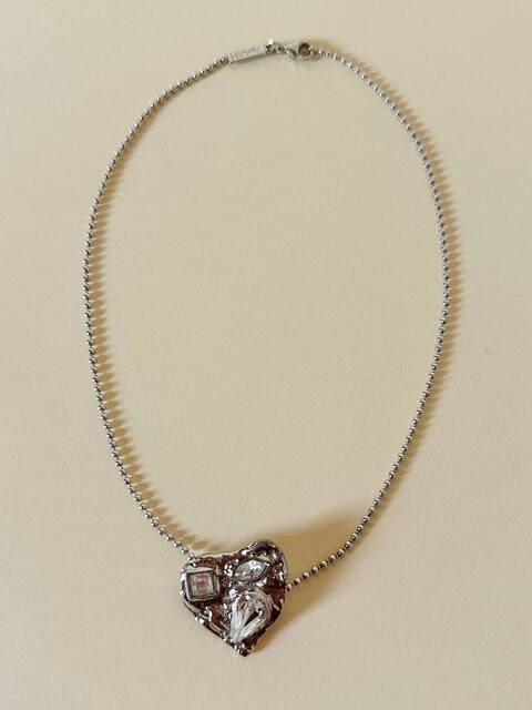 Collier argento con ciondolo a forma di cuore e cristalli incastonati “Yves Saint Laurent”