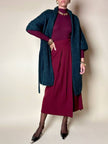 Cardigan Carven in lana verde con manica a tre quarti e cintura in vita