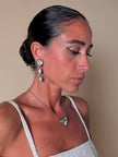 Collier argento con ciondolo a forma di cuore e cristalli incastonati “Yves Saint Laurent”