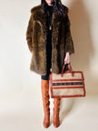 Borsa Yves Saint Laurent in canvas beige con profili color cuoio e motivo greca con logo