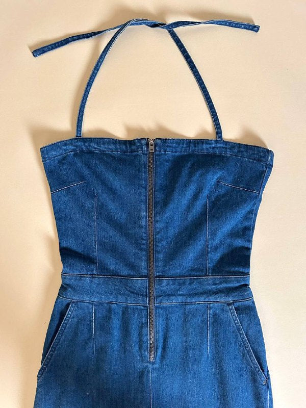 Jumpsuit Calvin Klein in jeans modello a fascia con pantalone a palazzo e zip frontale
