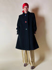 Cappotto nero con maxi bottoni gioiello multicolor “Yves Saint Laurent”