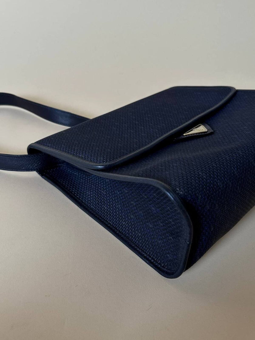 Borsa messenger in tessuto plastificato e pelle blu “Yves Saint Laurent”