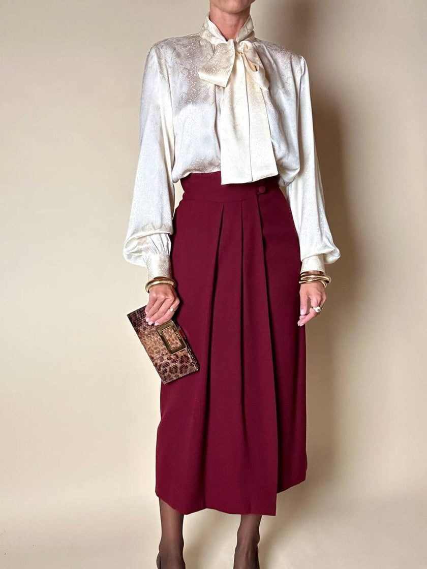 Blusa Yves Saint Laurent con fiocco al collo in seta jacquard avorio fantasia pitone