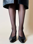Décolleté vintage Valentino Garavani Miss V in vernice nera traforata con logo nel tacco