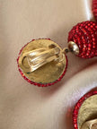 Maxi clip pendenti con sfere ricoperte di perline rosse