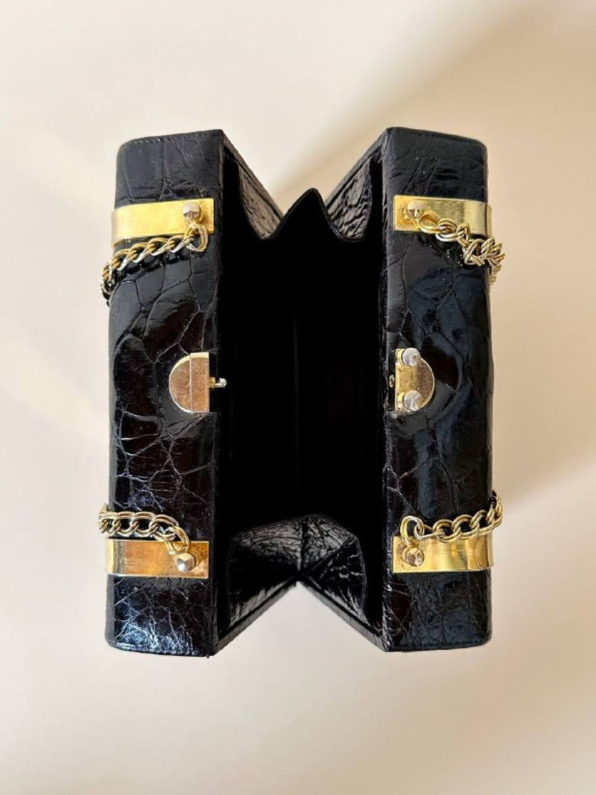 Borsa a bauletto in pelle stampa coccodrillo color testa di moro con manici a catena