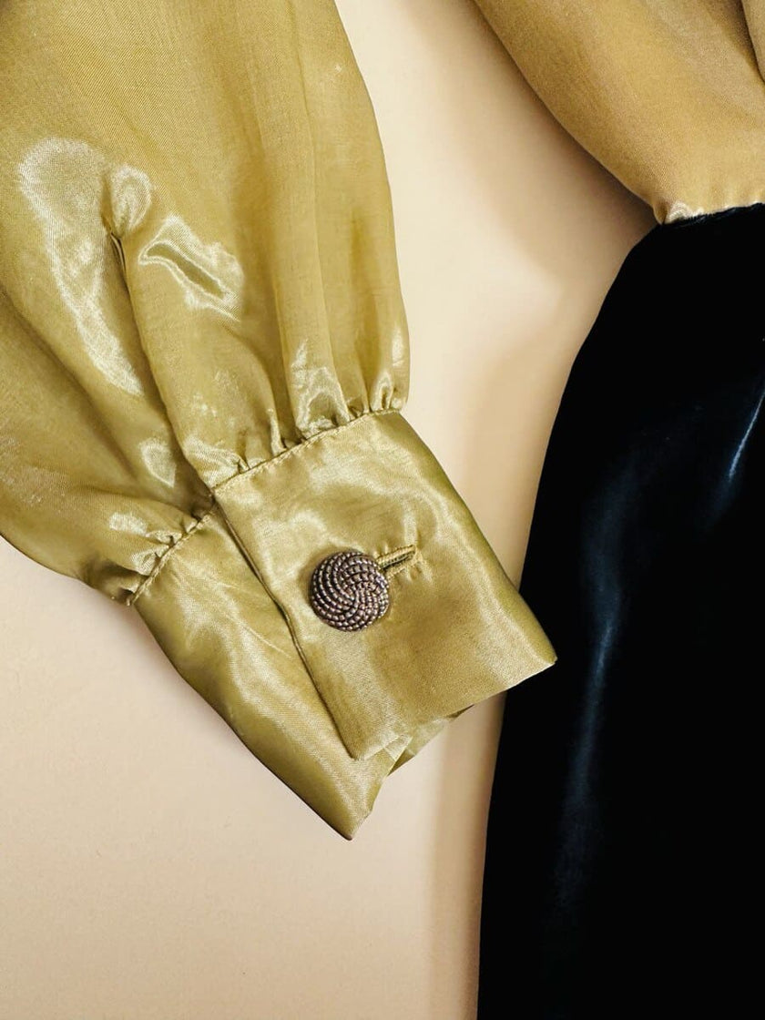 Wrap dress in velluto nero e organza ottone