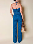 Jumpsuit Calvin Klein in jeans modello a fascia con pantalone a palazzo e zip frontale