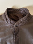 Bomber con maniche rimovibili in pelle color fango “Arpell”