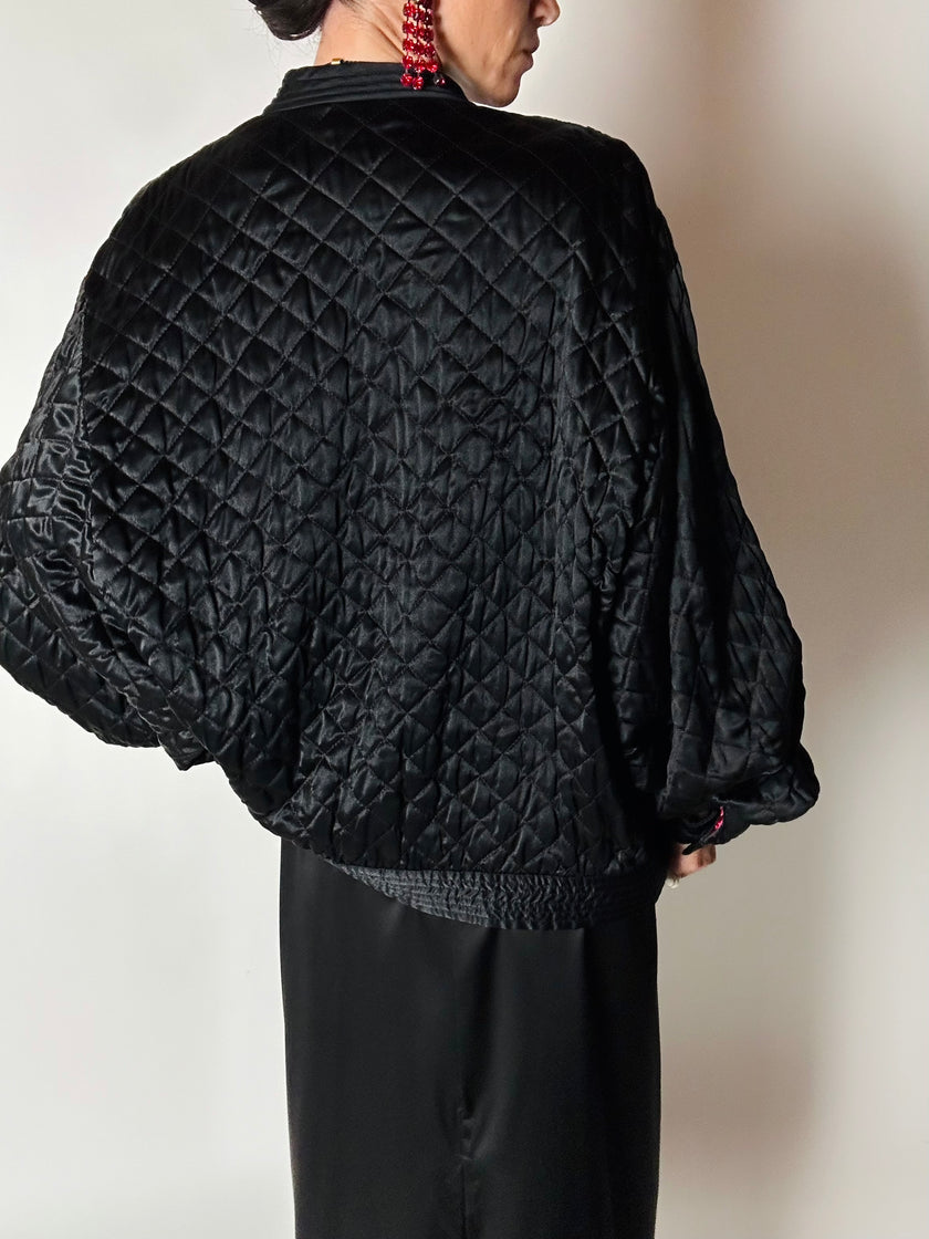 Bomber vintage Valentino Boutique in raso di seta nera trapuntato con fodera rossa