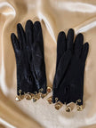 Guanti in pelle nera con charm dorati a forma di cuore “Sermoneta”