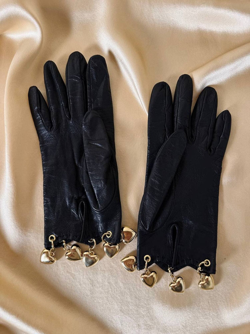 Guanti in pelle nera con charm dorati a forma di cuore “Sermoneta”