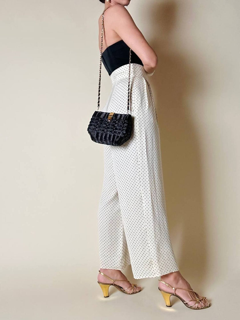 Sac bandoulière en osier et raphia noir avec bandoulière chaîne dorée