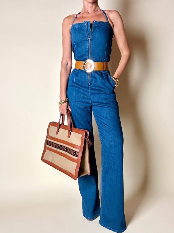 Jumpsuit Calvin Klein in jeans modello a fascia con pantalone a palazzo e zip frontale