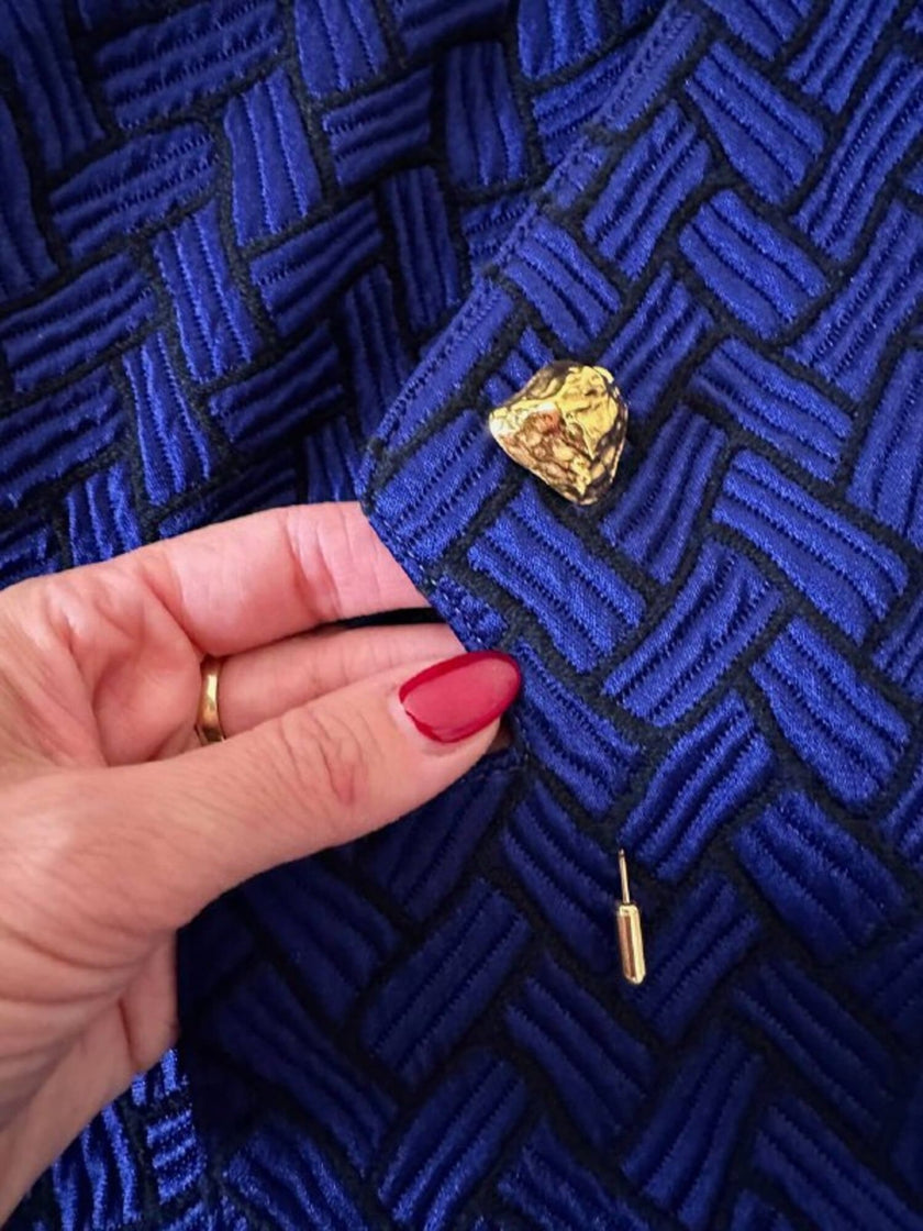 Spillone dorato con pepita “Yves Saint Laurent”
