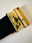 Cintura in camoscio nero con placca logata in metallo oro “Yves Saint Laurent”