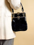 Mini bag artigianale in pitone nero con fodera rossa