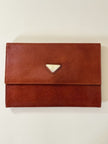Pochette Yves Saint Laurent in saffiano color cuoio con accessorio logato oro