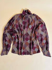 Bluse mit Schleifenkragen aus gemusterter Seide mit Rauten- und Hahnentritt-Details