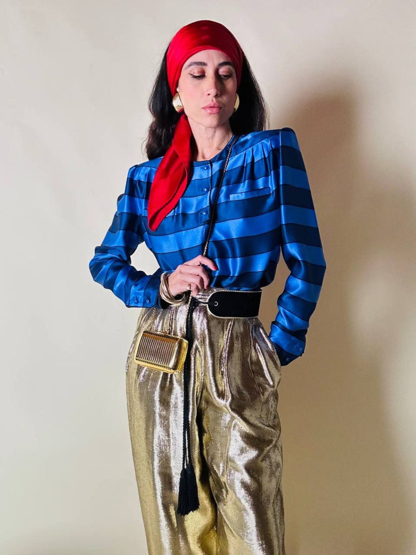 Mini clutch in metallo oro con tracolla in catena