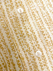 Camicia sartoriale in seta panna fantasia beige con nastro a collo