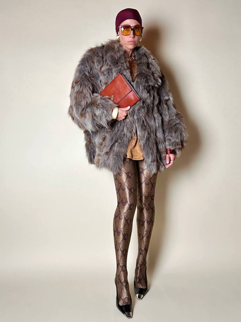 Collant Yves Saint Laurent in lycra fantasia pitone nei toni del beige bronzo e marrone