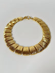 Collier vintage oro con elementi geometrici striati