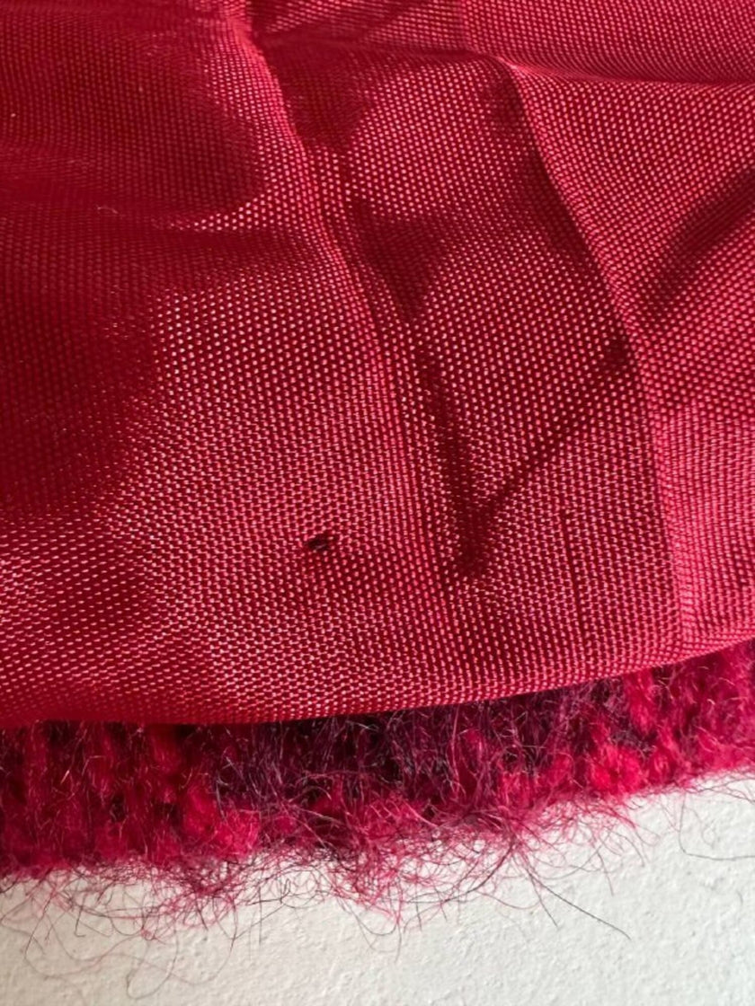 Cappottino in lana e mohair con fantasia a righe diagonali in due tonalità di rosso