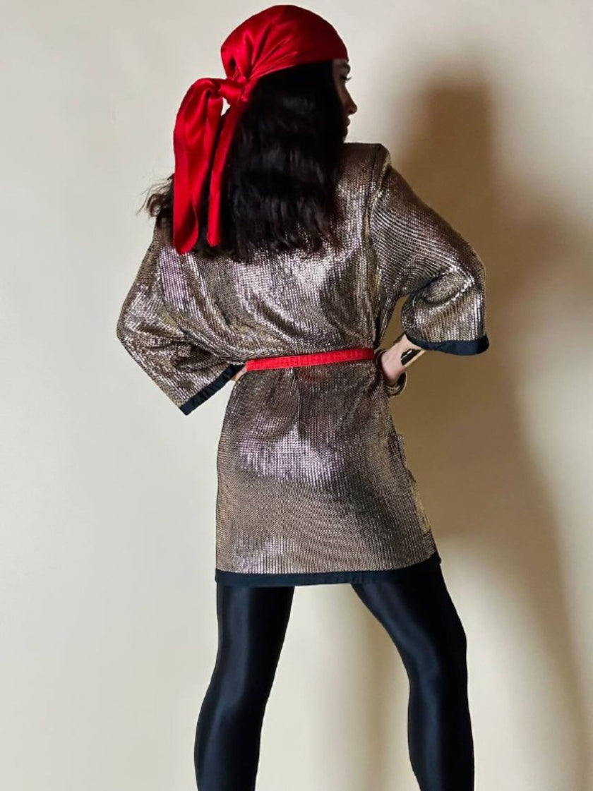 Mini dress oro in tessuto operato con profili neri in raso nero  “Yves Saint Laurent”