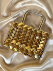 Mini bag gioiello a medaglie dorate