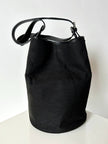 Secchiello vintage Yves Saint Laurent in tessuto nero millerighe con riporti in pelle