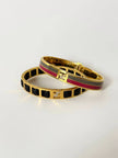 Bracciale vintage Fendi in metallo oro rifinito con smaltato grigio e rosso