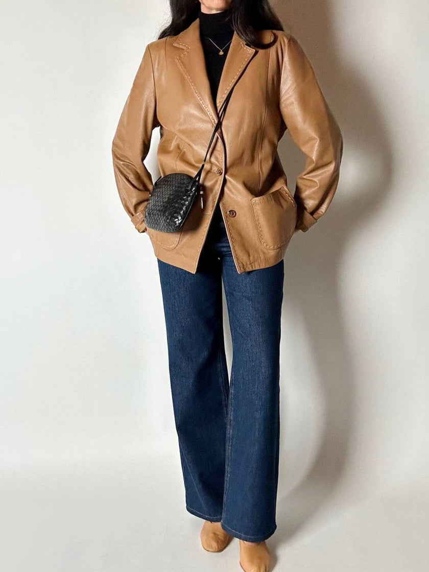 Vintage tan leather jacket with hand-stitched detailing by Claude Collections