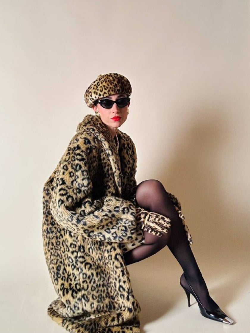 Eco pelliccia leopardata con maxi bottoni neri