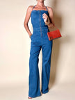 Jumpsuit Calvin Klein in jeans modello a fascia con pantalone a palazzo e zip frontale
