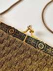 Borsa vintage Art Déco in lamé oro intrecciato con chiusura gioiello e nappa couture