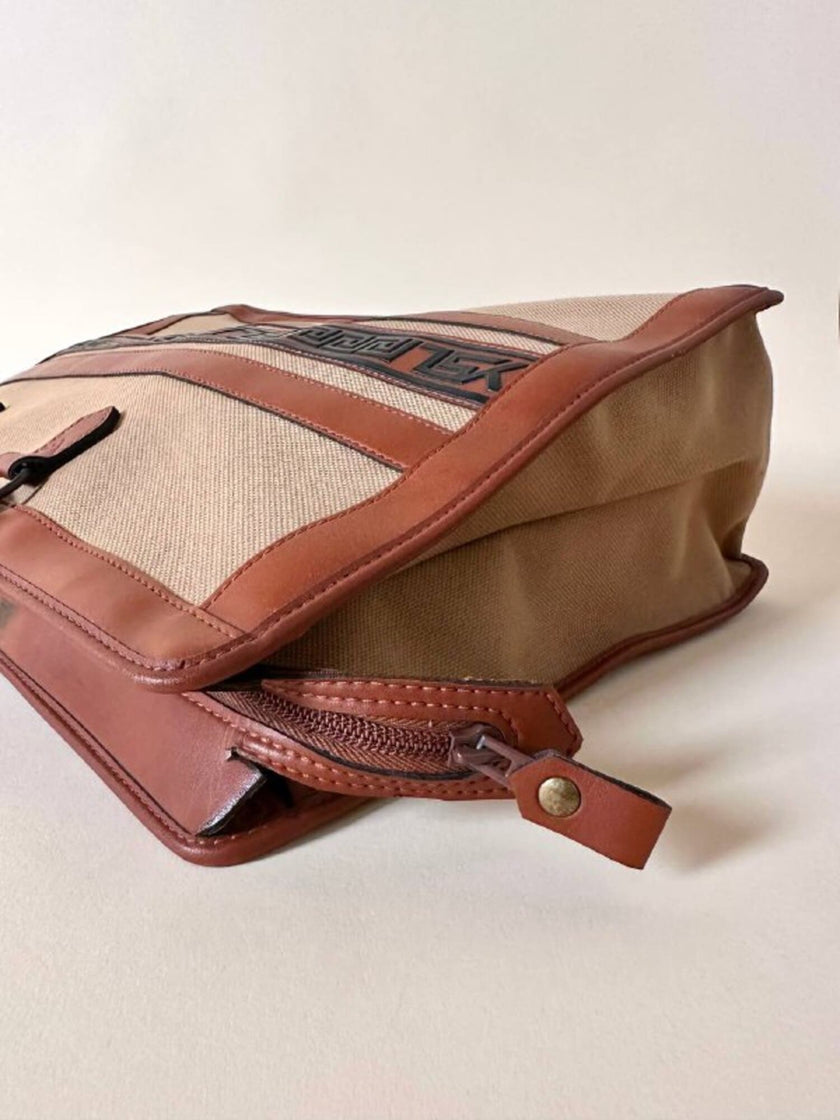 Borsa Yves Saint Laurent in canvas beige con profili color cuoio e motivo greca con logo