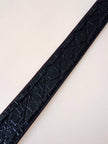 Cintura in pelle bordeaux trapuntata con fibbia dorata effetto filigrana