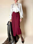 Blusa Yves Saint Laurent con fiocco al collo in seta jacquard avorio fantasia pitone