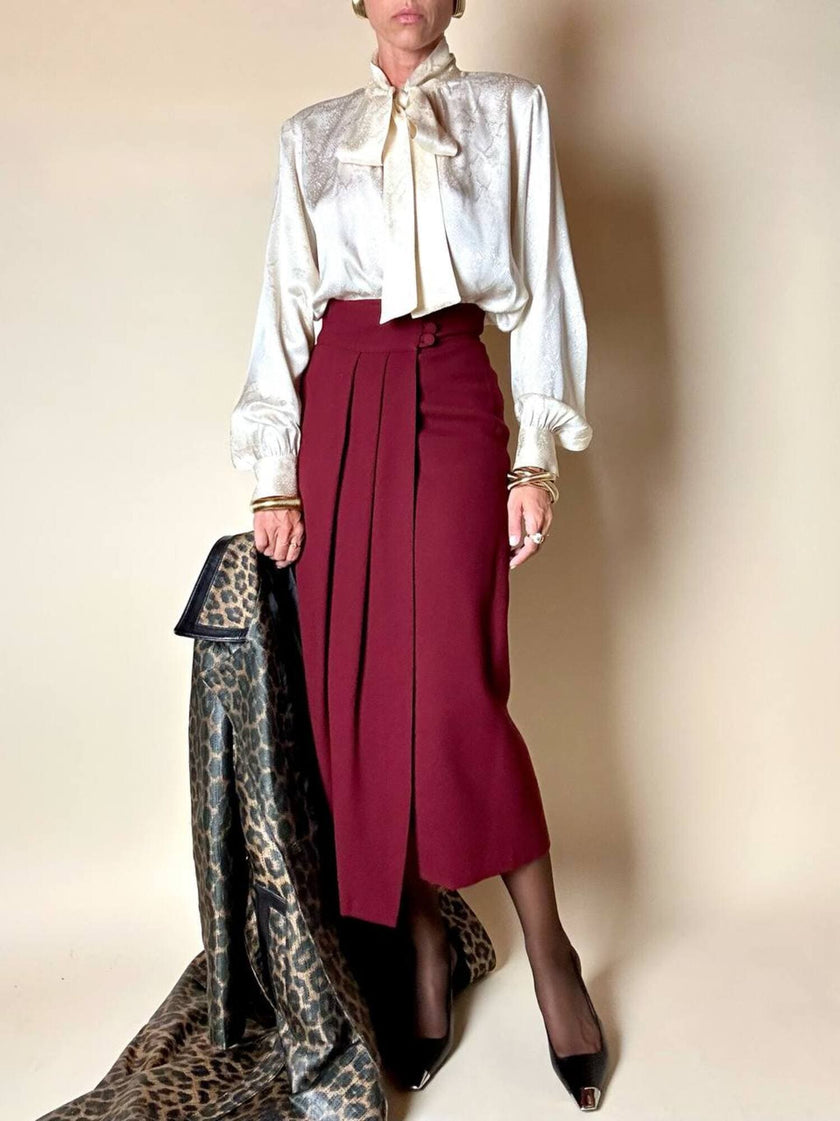 Blusa Yves Saint Laurent con fiocco al collo in seta jacquard avorio fantasia pitone