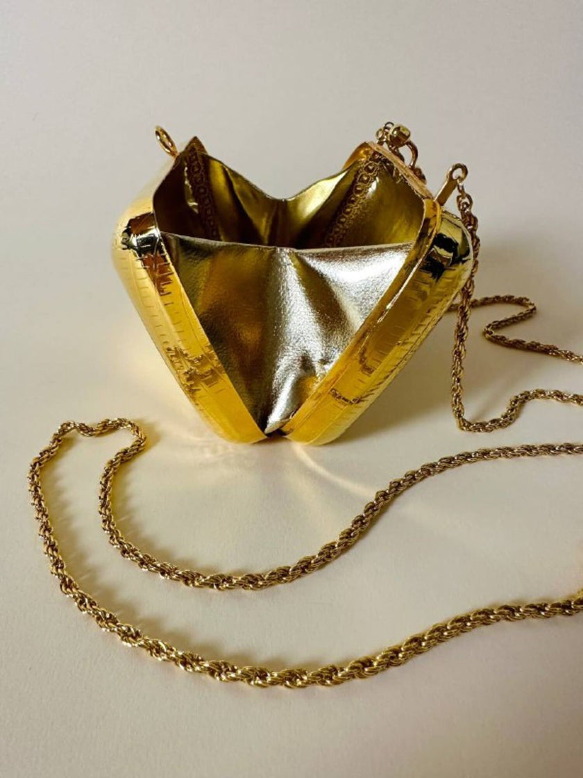 Mini clutch in metallo oro con tracolla in catena