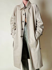 Trench color sabbia con fodera tartan “Idrostop”