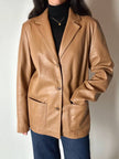 Vintage tan leather jacket with hand-stitched detailing by Claude Collections