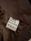 Bomber con maniche rimovibili in pelle color fango “Arpell”