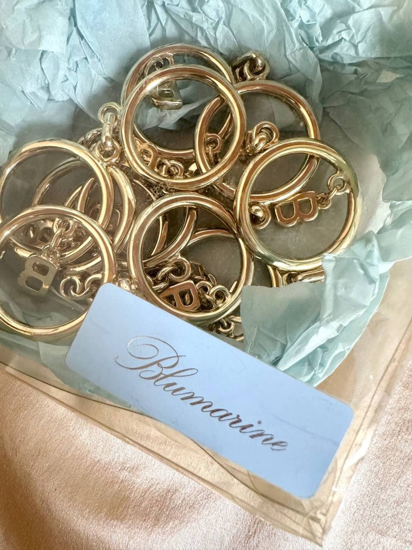 Cintura dorata a catena con charm a forma di B “Blumarine”
